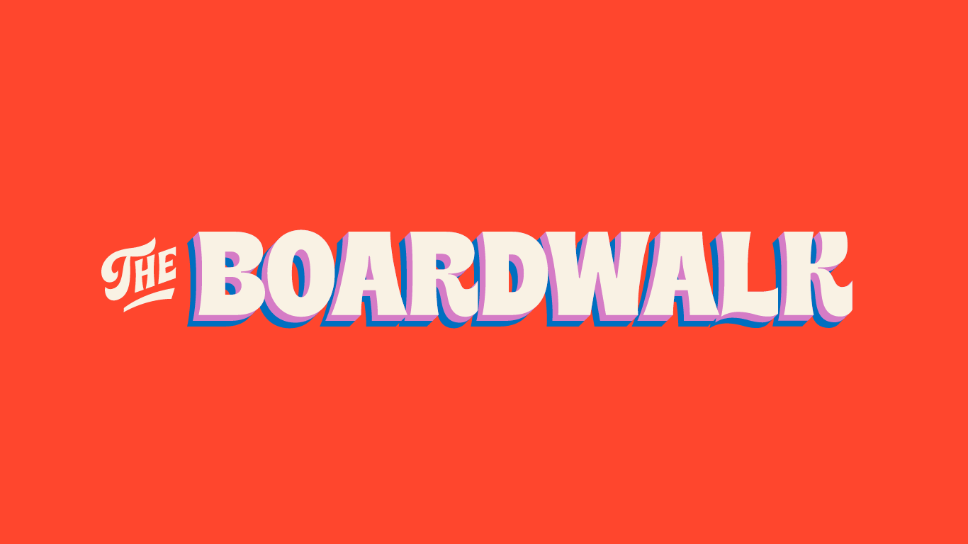 The Boardwalk event logo in dimensional lettering on a coral background